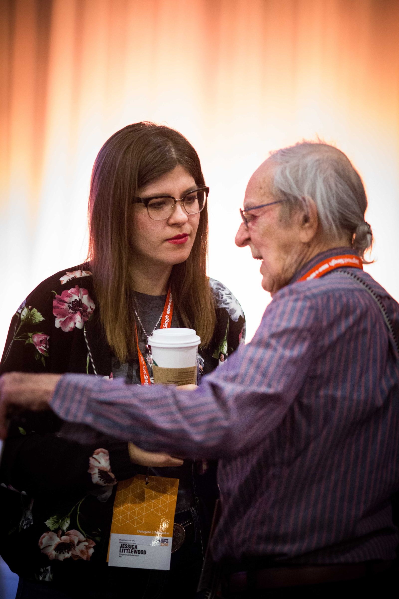 Alberta MLA Jessica Littlewood talks to a fellow NDP delegate at the party's national convention in Ottawa on Feb. 16, 2018. Photo by Alex Tétreault