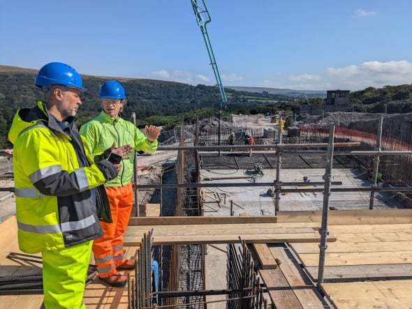 RheEnergise employees oversee the construction of a High-Density Hydro® demonstrator project near Plymouth in Devon, Britain. September, 2024 (Handout from RheEnergise)