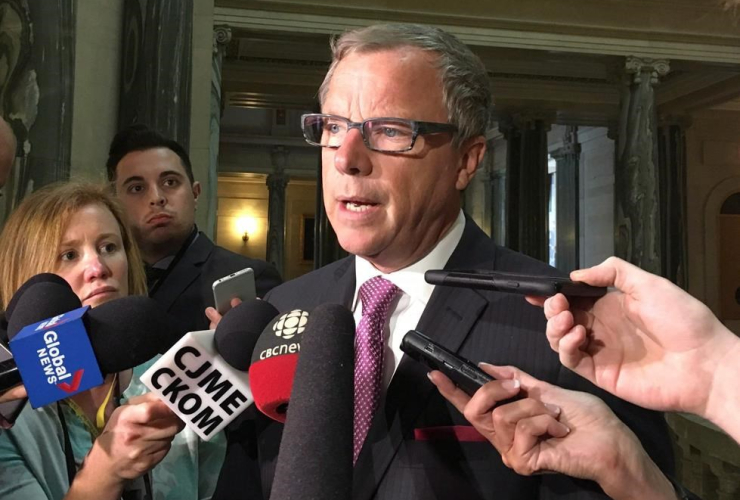 Saskatchewan Premier Brad Wall talks to members of the media in Regina, Tuesday, March 7, 2017.