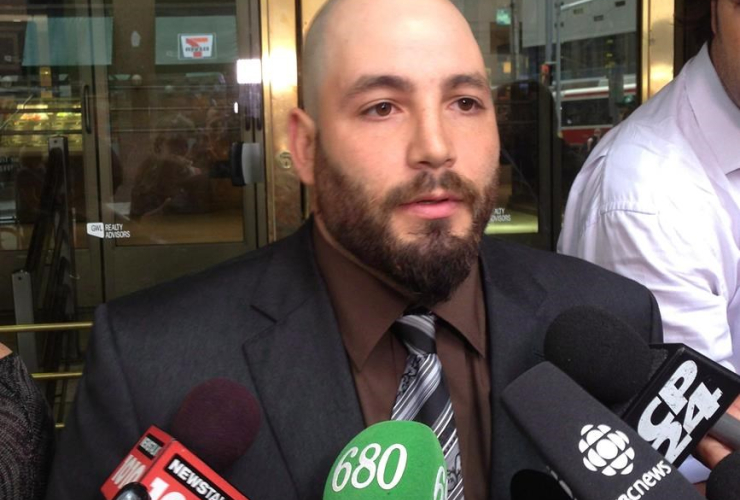 Adam Nobody talks to media outside court in Toronto, Thursday, Sept.12, 2013.