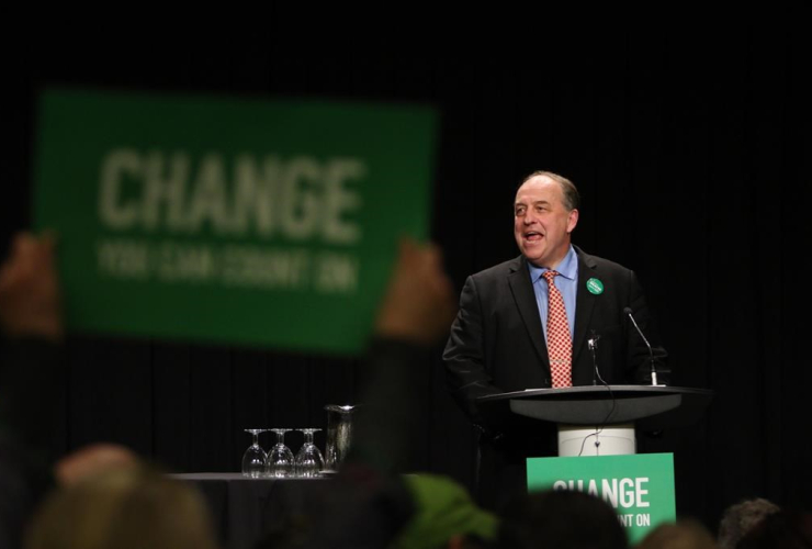 B.C. Green party leader Andrew Weaver is joined by several candidates and special guests as he speaks to supporters during a rally at the Victoria Conference Centre in Victoria, B.C., on Wednesday, April 12, 2017.