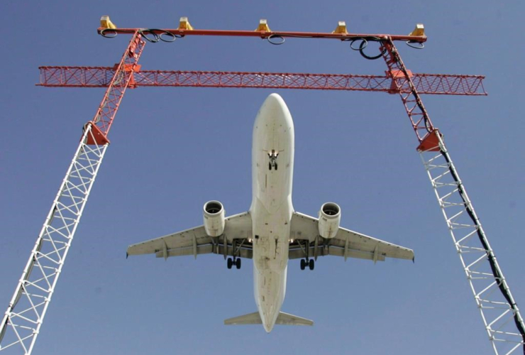 An Air Canada flight makes its final approach as it lands at Pearson International Airport in Toronto on Sept. 30, 2004.