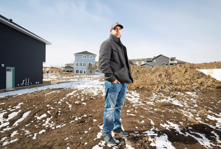 Farid El-Hayouni on Prospect Drive where his old house burned down during the wildfires last year in Fort McMurray, Alta. Friday, April 21, 2017. File photo by The Canadian Press/Todd Korol