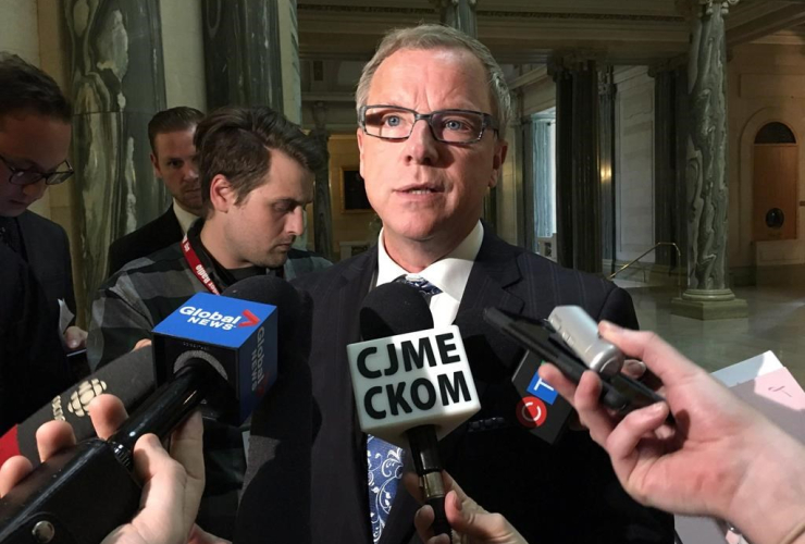 Saskatchewan Premier Brad Wall talks to reporters at the legislature in Regina, Monday, May 1, 2017.