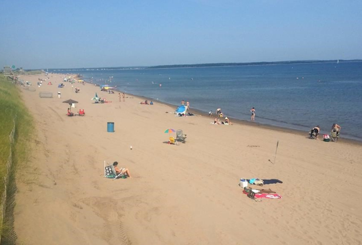 People are shown on Parlee Beach, Shediac, N.B. in this undated image. Handout photo by Tourism New Brunswick