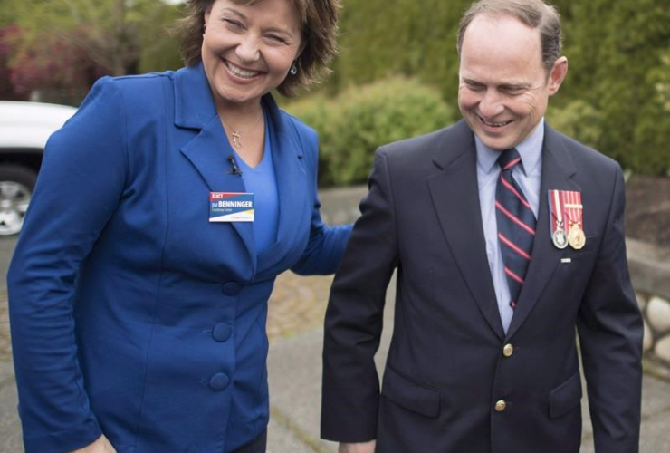 B.C. Liberal leader Christy Clark shares a laugh with local candidate Jim Benninger during a campaign stop in Courtney, B.C., on Monday, May 8, 2017. File photo by The Canadian Press/Jonathan Hayward