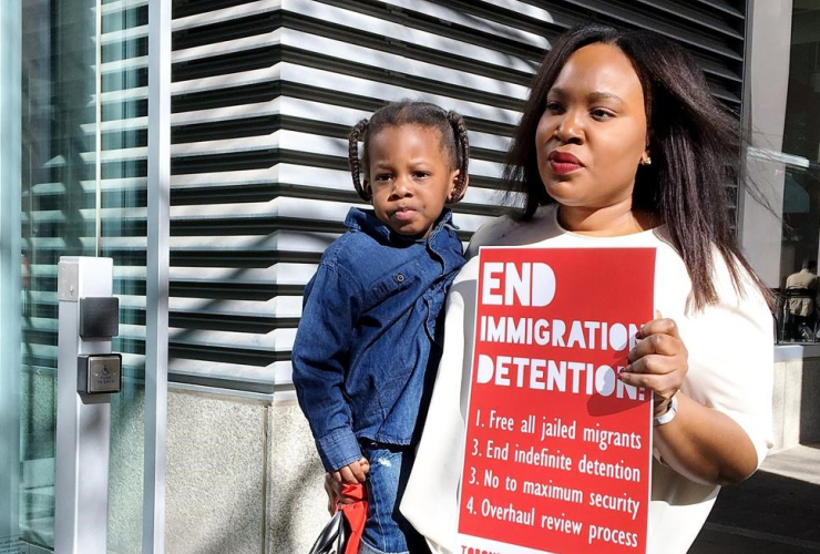 Kimora Adetunji, 33, is seen with her son King, 2, outside Federal Court in Toronto on Monday, May 15, 2017, where indefinite immigration detention was subject of a court hearing.