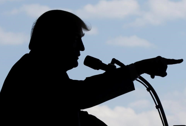 President Donald Trump addresses U.S. military troops and their families at the Sigonella Naval Air Station, in Sigonella, Italy, Saturday, May 27, 2017.