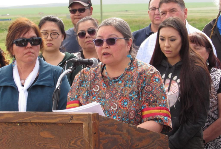 Deputy superintendent Annette Bruisedhead of the Blood Tribe in southern Alberta speaks to reporters in Standoff, Alta., on Thursday, June 22, 2017.