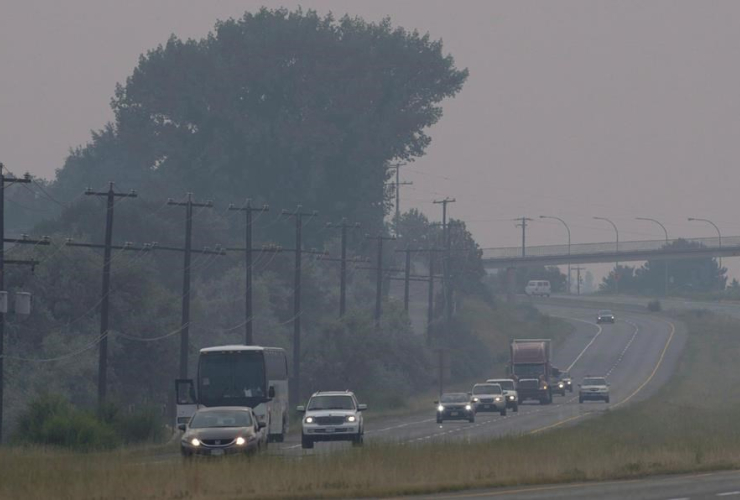 Cars, trucks, thick smoke, wildfires, Kamloops, B.C.,