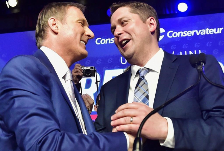 Maxime Bernier and Andrew Scheer at the federal Conservative leadership convention in Toronto on Saturday, May 27, 2017. Photo by The Canadian Press/Frank Gunn