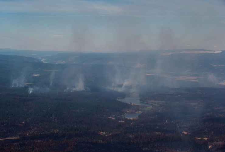 Smoke, wildfires, burned trees, aerial view, Canadian Forces, Chinook helicopter, Williams Lake, B.C.,