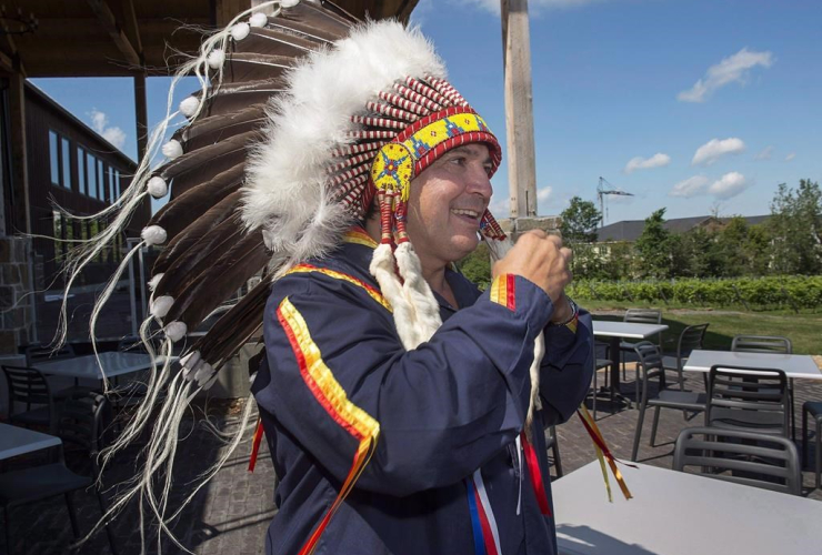 Perry Bellegarde, National Chief of the Assembly of First Nations, headdress, Atlantic MP, First Nations chiefs in Wolfville.