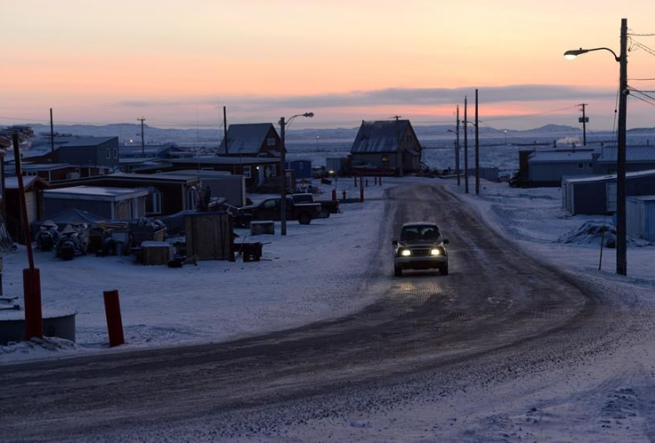 sun rises, car, road, Iqaluit, Nunavut,