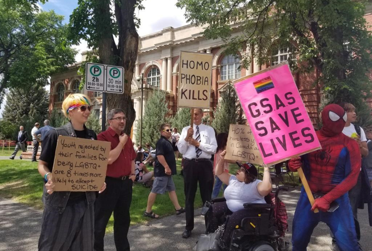 People, signs, courthouse, Medicine Hat, 