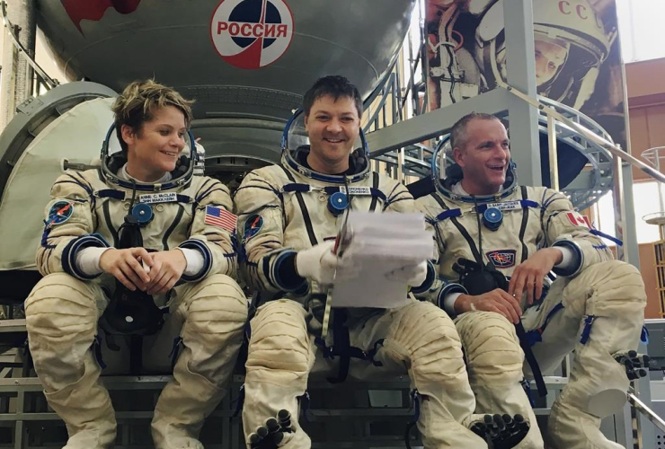 Astronauts, Anne McClain, Oleg Kononenko, David Saint-Jacques, Soyuz simulator, Gagarin Cosmonaut Training Center, Star City, Russia, 