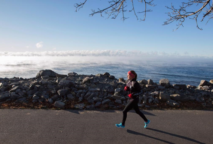 woman, runs, Lake Ontario, cold mist,