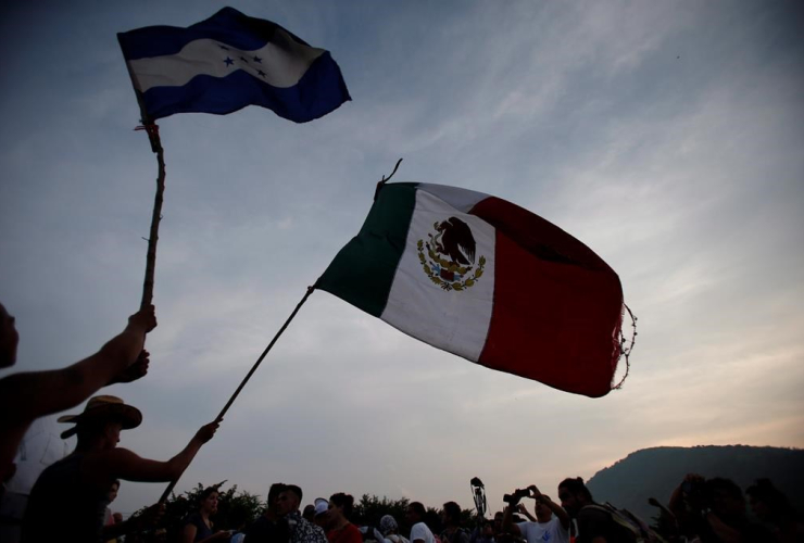 Migrants, wave, flags, Honduras, Mexico,