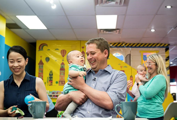 Federal Conservative leader Andrew Sheer, Antonio Wang, caregiver, Anna Yang, 