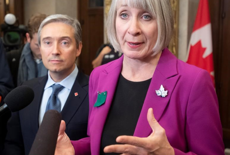 Foreign Affairs Minister Francois-Philippe Champagne, Minister of Health Patty Hajdu,