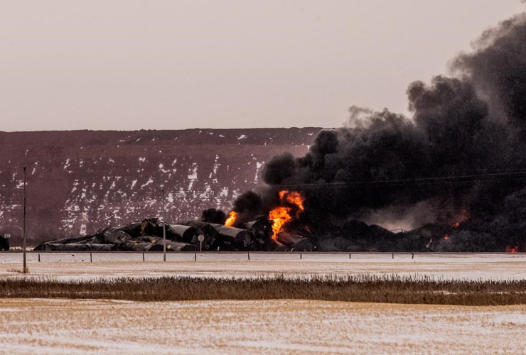 Smoke, derailed Canadian Pacific Railway train,  Guernsey, Sask.,