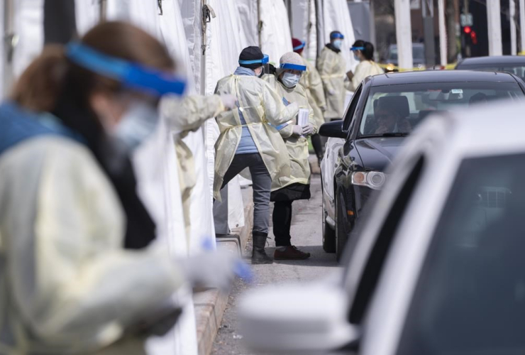 Health workers, screen patients, walk-in COVID-19 test clinic, Montreal,