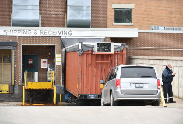 minivan, funeral home, storage container, temporary morgue, Windsor Regional Hospital Met Campus,