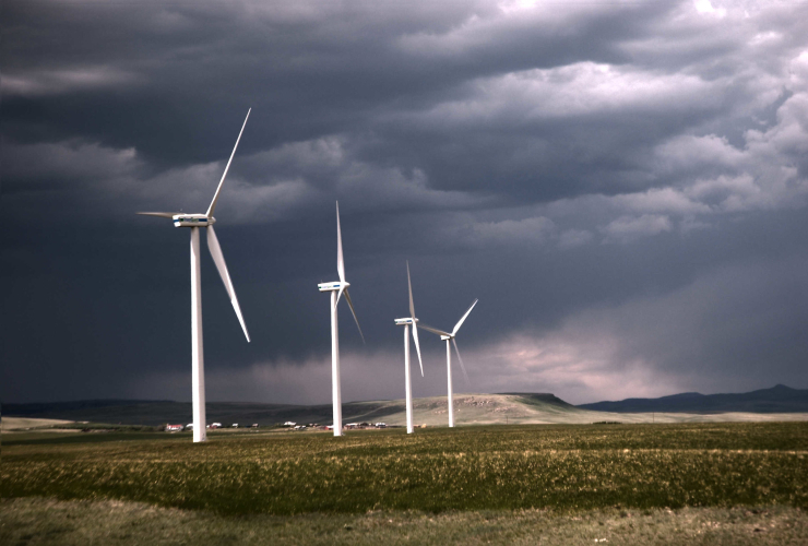 windmills with a stormy sky