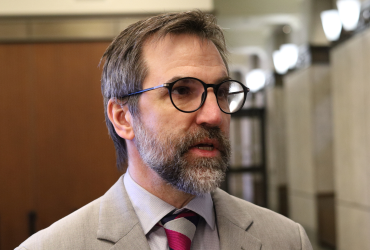 headshot of federal environment minister steven guilbeault, inside West Block