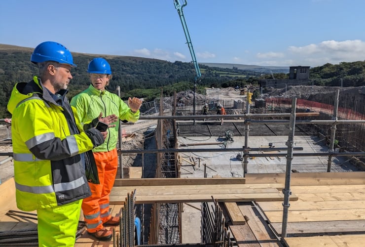 RheEnergise employees oversee the construction of a High-Density Hydro® demonstrator project near Plymouth in Devon, Britain. September, 2024 (Handout from RheEnergise)