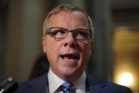 Premier Brad Wall speaks with members of the media following the 2017 budget speech at the Legislative Building in Regina Wednesday, March 22, 2017.