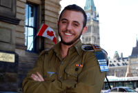 Shachar Erez, the first transgender officer in the Israel Defence Forces, is shown below Parliament Hill in Ottawa, Monday, April 3, 2017.