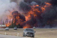 giant fireball, wildfire, forest, Fort McMurray, highway 63,