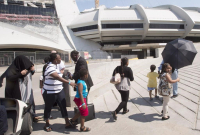 group, asylum seekers, Olympic Stadium, Montreal, 