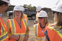 Alberta Energy Minister Margaret McCuaig-Boyd (left) and Premier Rachel Notley tour Enbridge's Line 3 pipeline replacement site at Hardisty, Alta. on Aug. 10, 2017.