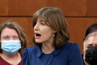 Close up of a woman mid-sentence in the House of Commons