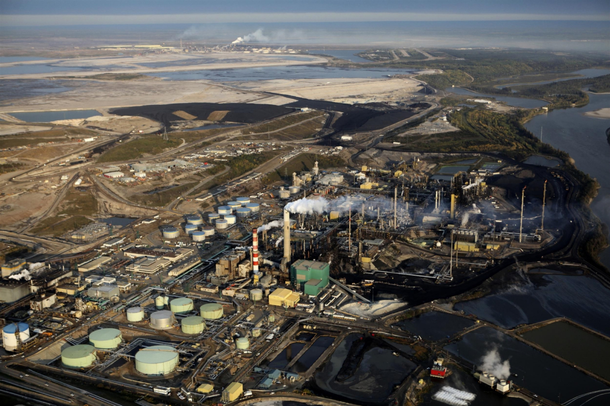 Suncor Refinery outside of Fort McMurray with the Syncrude Refinery visible in the background. Photo by Colin O'Connor, Greenpeace.