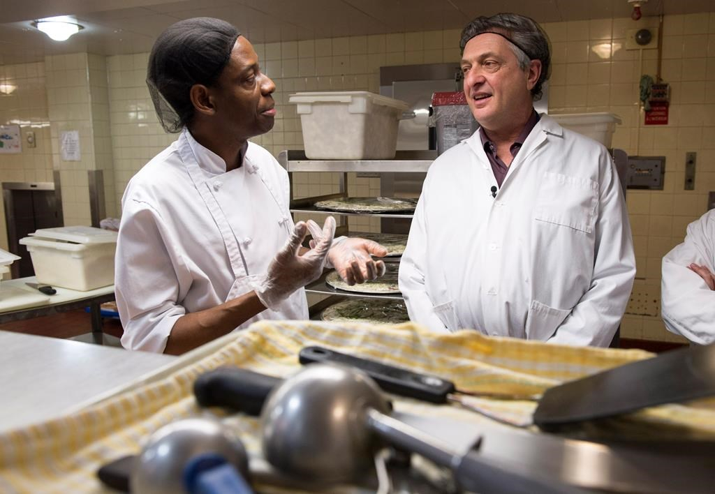 Filippo Grandi, UN high commissioner for refugees, Jean-Claude Puati, refugee, Democratic Republic of Congo, hospital cafeteria,