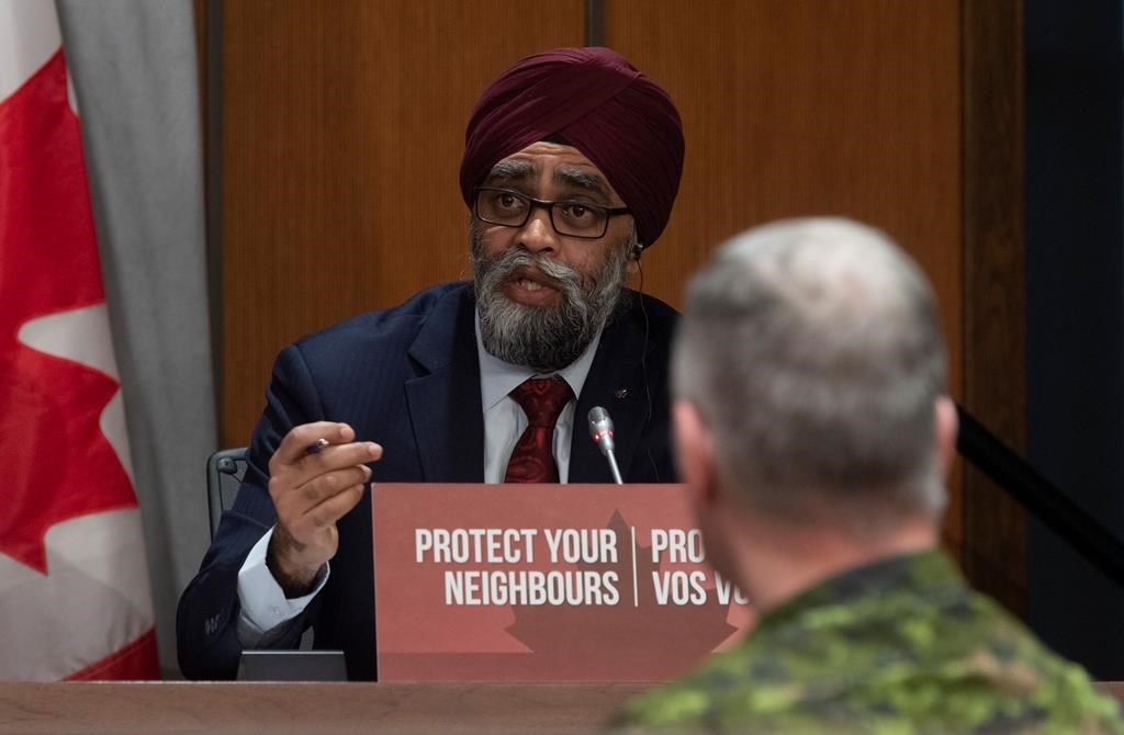 Chief of Defence Staff Jonathan Vance, National Defence Minister Harjit Sajjan,