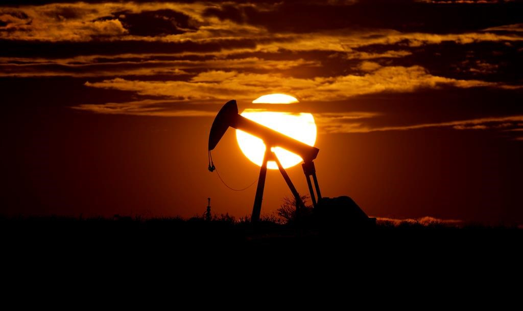 sun sets, pump jack, Karnes City, Texas, 