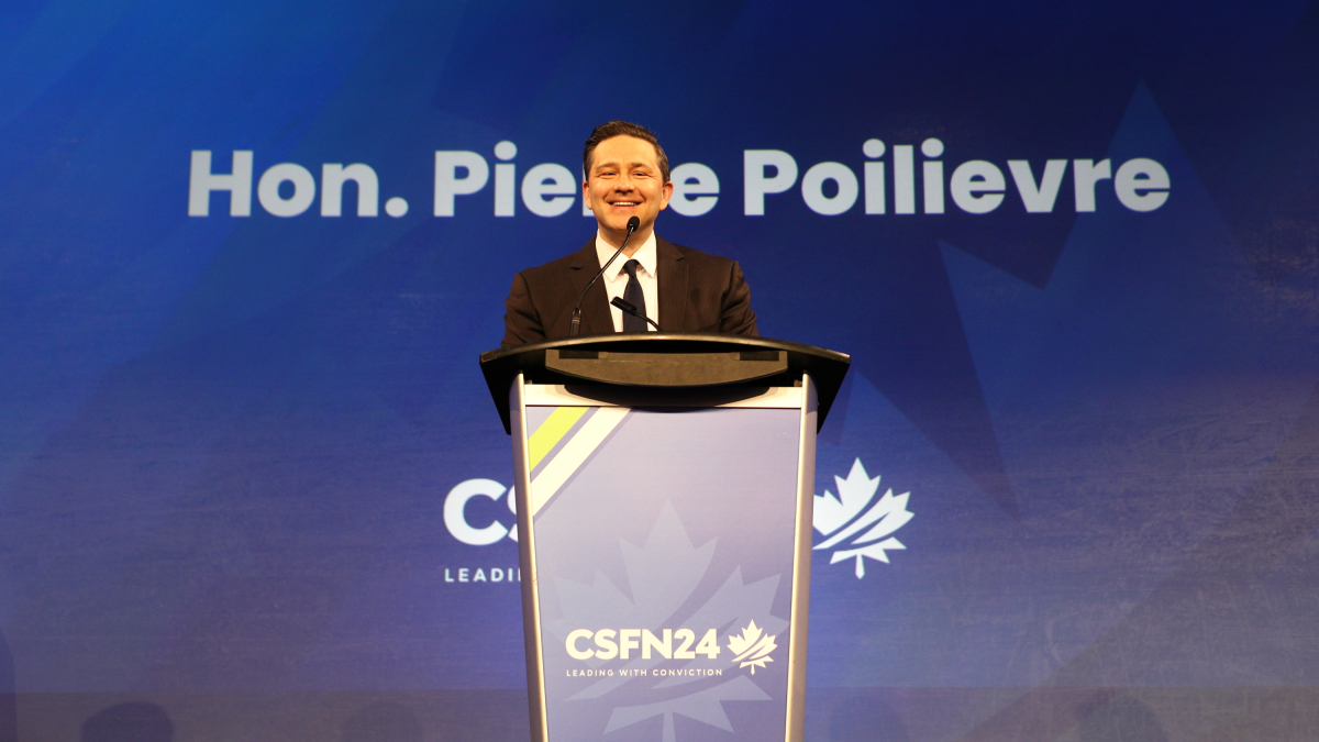 pierre poilievre gives a keynote speech at a conservative conference