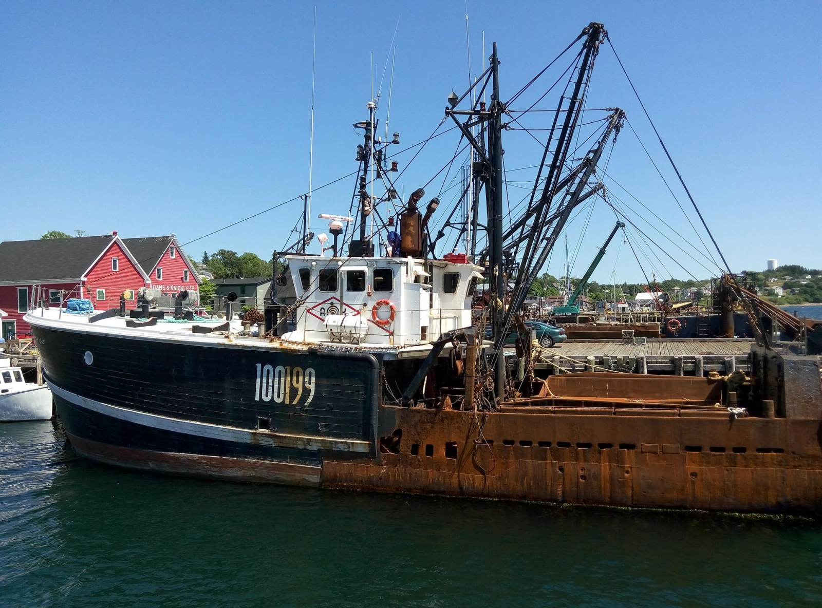 A fishing boat sits in Lunenburg’s harbour. The industry is still an important player in Lunenburg’s economic stability. Photo from Creative Commons