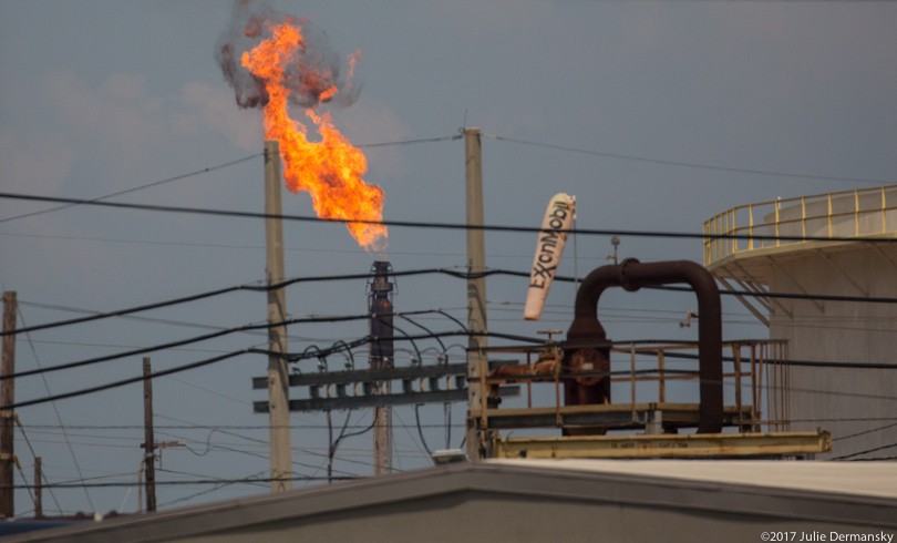 Exxon refinery catches fire day after U.S. government settles over