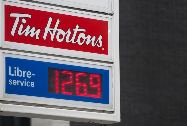 A sign for gas prices is shown at a gas station in Montreal, Wednesday, April 12, 2017.